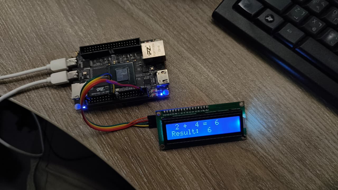 Hardware setup of the FPGA Adder showing the PA-StarLite board and LCD