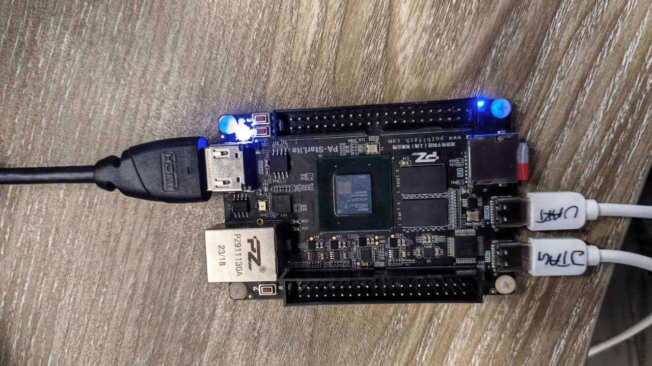 Puzhi PA200T-StarLite Artix-7 development board with HDMI, UART and JTAG cables connected